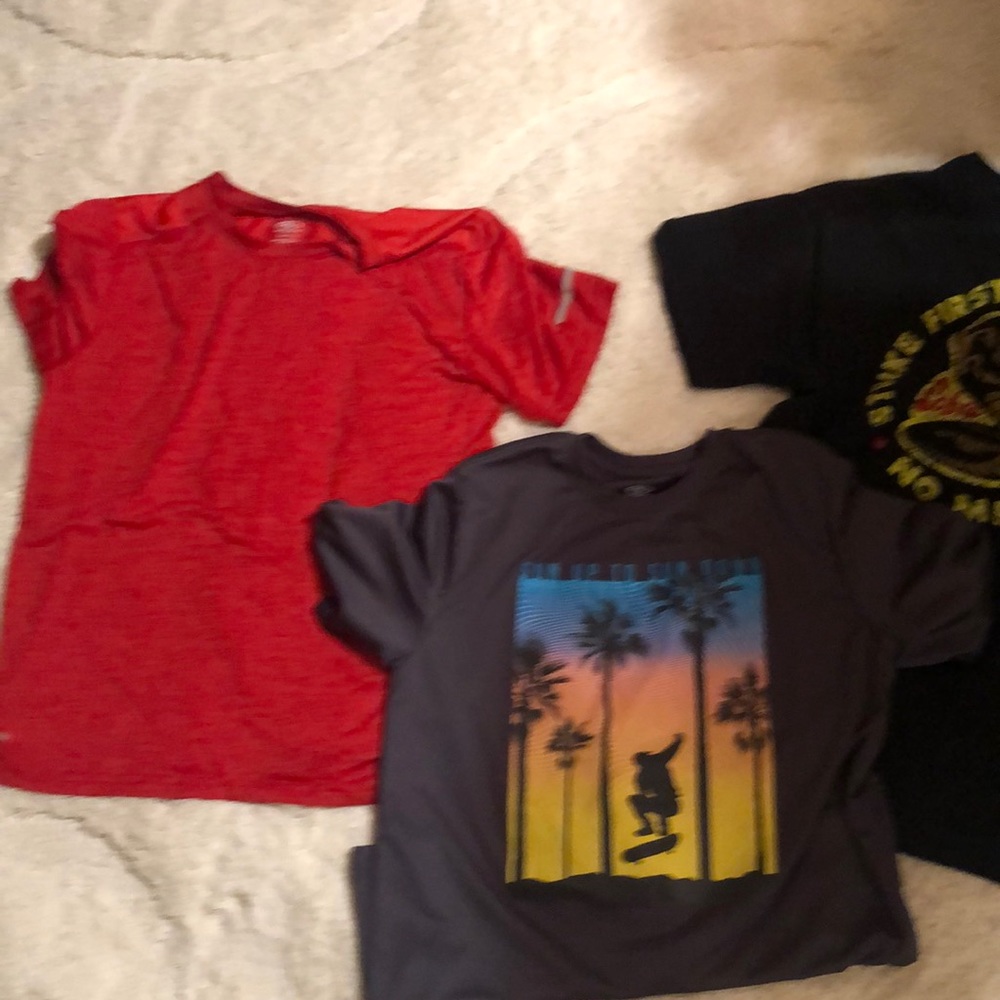 A Bundle of Boys Size 18-20 Tee Shirts. Two of them are Athletic Works.